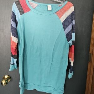 Turquoise striped sweater tunic with small tear as shown. Size Large